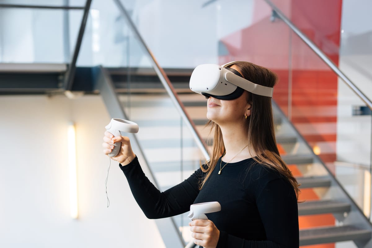 Young woman wearing VR equipment