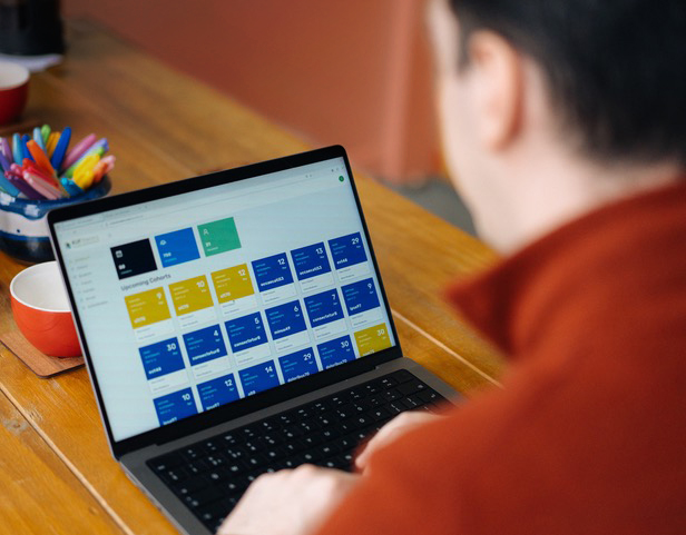 Photograph of person using the KUF training management tool